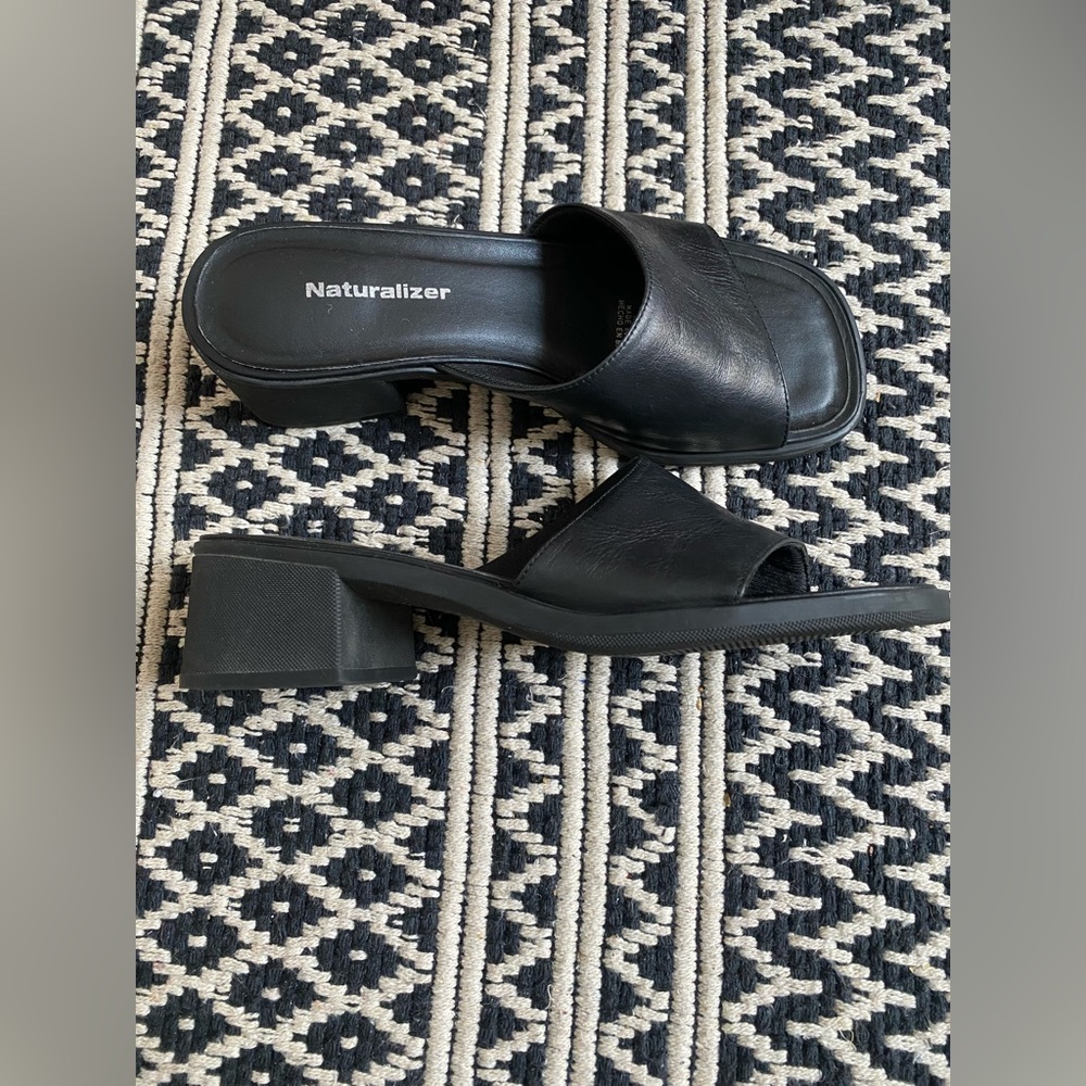 Black Slip-on sandals.